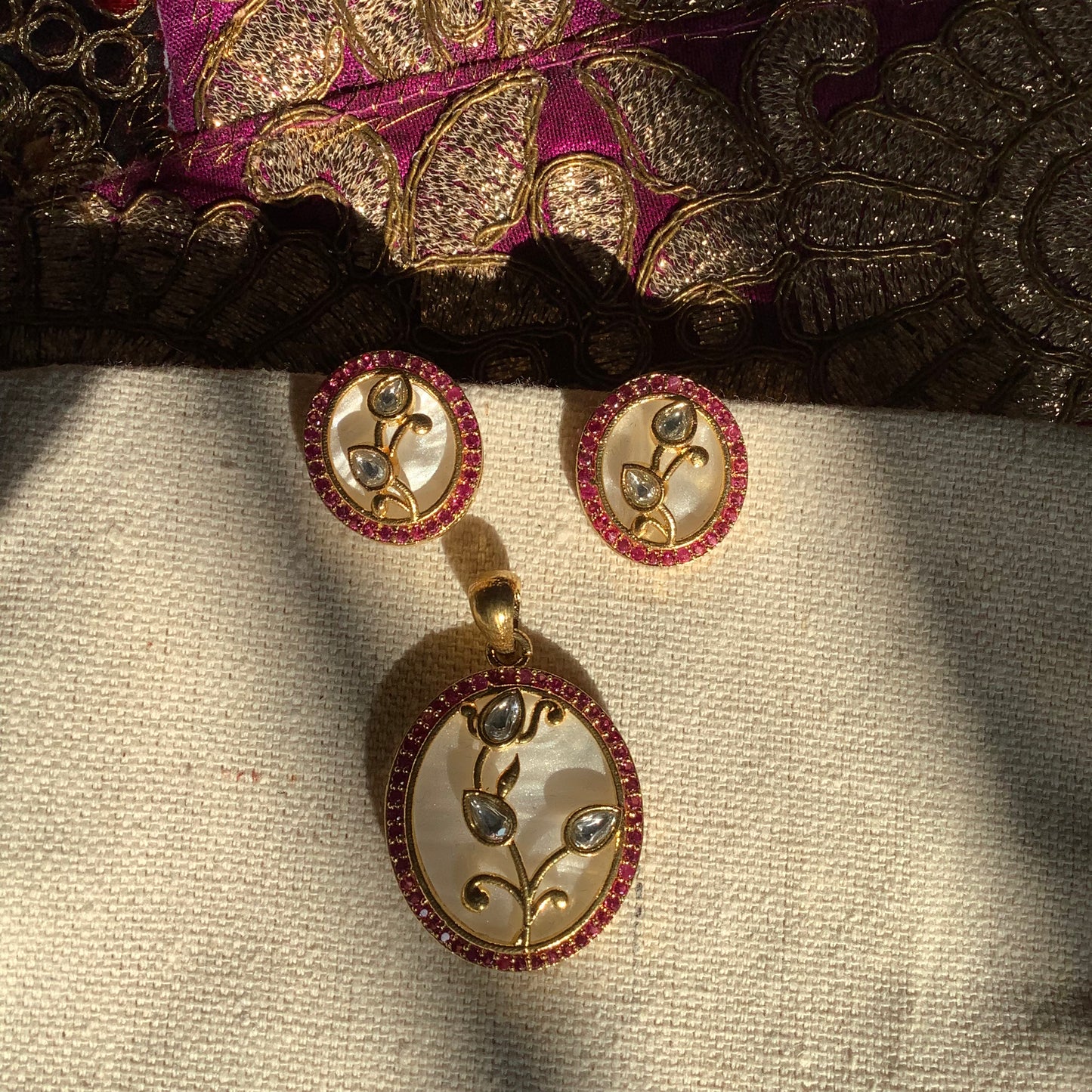 Salvanity Rajsi Kundan and American Diamond Oval Pendant and Earrings set