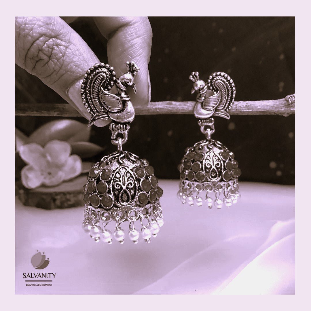 #Artificial_Jewellery# - #Salvanity_Salvan Overseas# - Danglers - Salvanity German Silver Stone Peacock & Embellished dome Jhumki